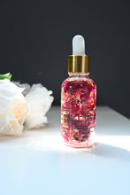Load image into Gallery viewer, Rose Quartz Infused Manifestation and Attraction Oil: Beauty Ritual, Love Spell (1oz Dropper Bottle)
